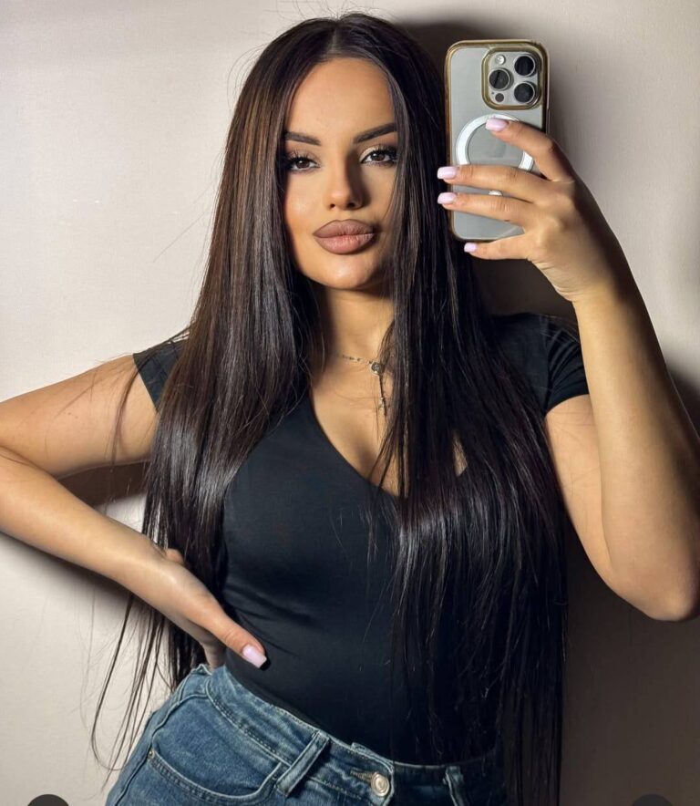 Black basic top with a V-neckline.